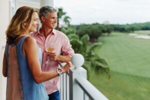 Couple on vacation overlooking golf course